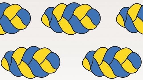 Symbol of braided yeast buns in the colours of the Ukraine flag.   