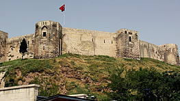 The Gaziantep Castle in Turkey is photographed from below.