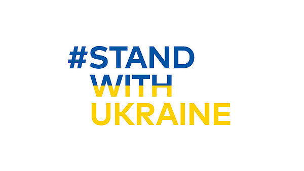 This graphic includes the text "#StandwithUkraine" in blue and yellow writing against a white background.