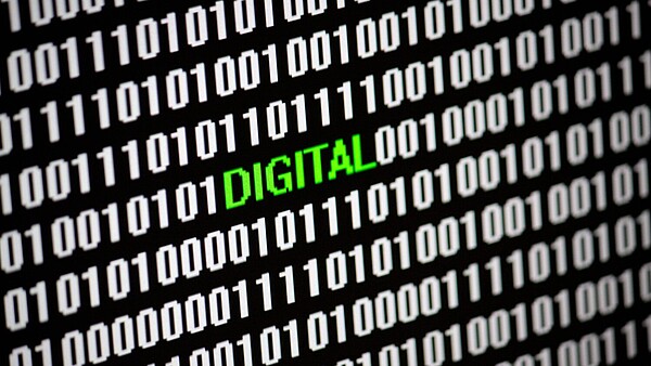 Lines of computer codes are interrupted by the word "Digital" in green letters.