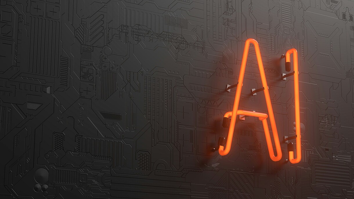 © Image: Igor Omilaev on Unsplash © Image: Igor Omilaev on Unsplash An organge neon sign that says AI hanging on a wall.