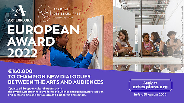  This graphic announces the Art Explora European Award. The lower part of the image is purple with informational text. The upper part depicts a person hanging an artwork at the wall on the left. On the right are children sitting on the floor in a white exhibition space.